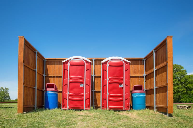 Short-term porta potty units staged for delivery in Beeville, Texas